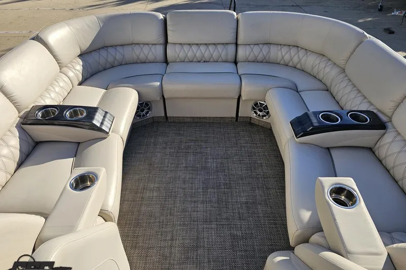 Slide: The Image of Luxurious seating on 2015 Bennington 2550 QBR boat with cup holders and speakers. - 68