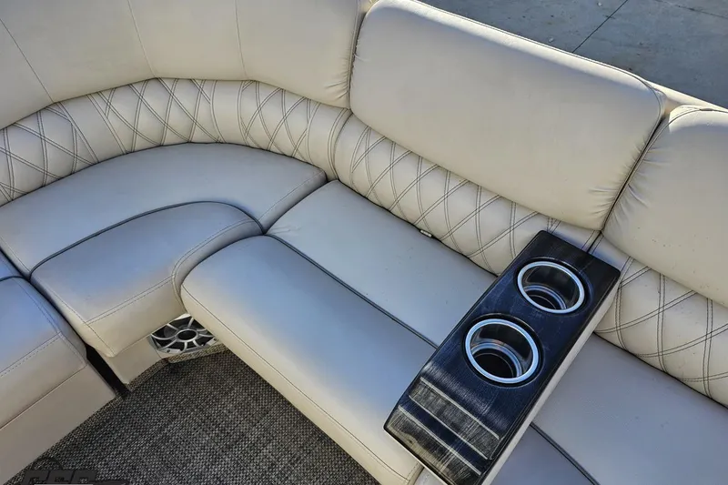 Slide: The Image of Luxurious seating with cup holders on a 2015 Bennington 2550 QBR boat. - 72