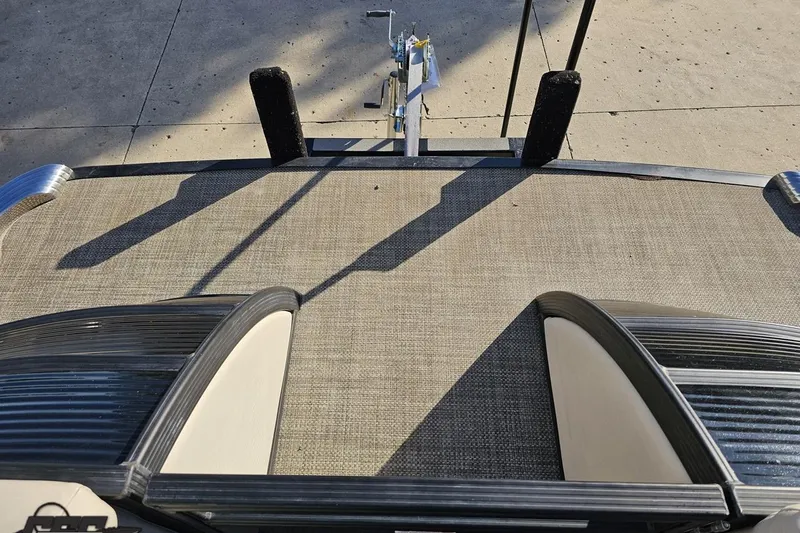 Slide: The Image of 2015 Bennington 2550 QBR boat deck with trailer, viewed from above. - 81