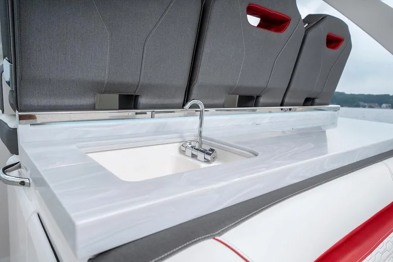 Slide: The Image of 2023 Tiara Yachts 34 LS boat interior with luxurious seating and modern design. - 12