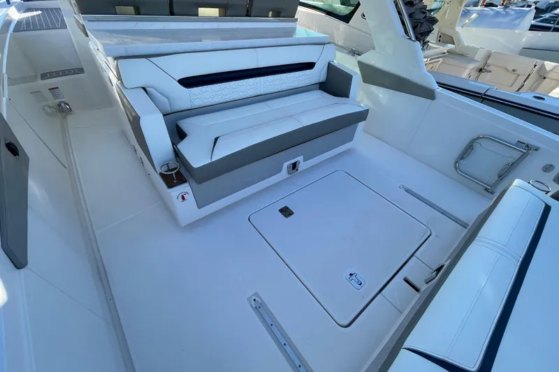 Slide: The Image of 2023 Tiara Yachts 34 LS interior with sleek seating and modern design. - 33