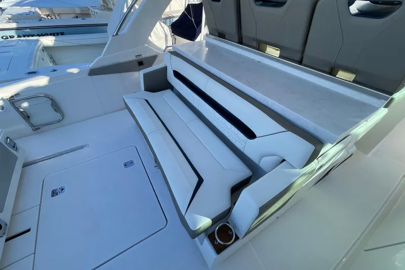 Slide: The Image of 2023 Tiara Yachts 34 LS interior seating with modern design and luxurious features. - 34