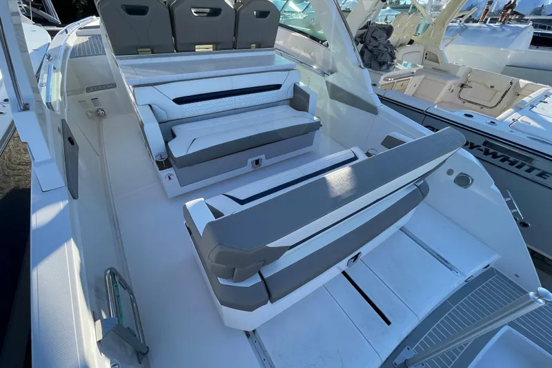 Slide: The Image of 2023 Tiara Yachts 34 LS interior with sleek seating and modern design. - 38