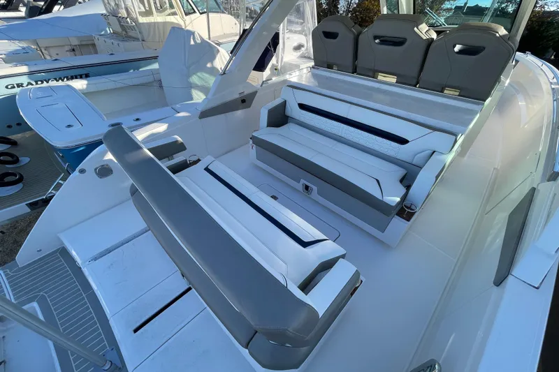 Slide: The Image of 2023 Tiara Yachts 34 LS interior with luxurious seating and modern design. - 39