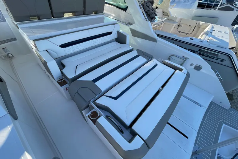 Slide: The Image of 2023 Tiara Yachts 34 LS luxury seating area with modern design and comfortable upholstery. - 40