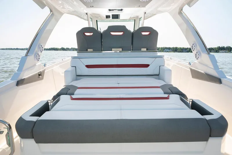 Slide: The Image of 2023 Tiara Yachts 34 LS luxury boat docked with covered seating and Garmin radar. - 9