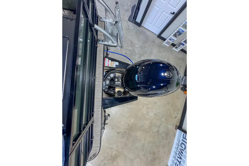 Slide: The Image of 2026 Veranda Vista 22F2/2/1 boat engine in showroom setting. - 13