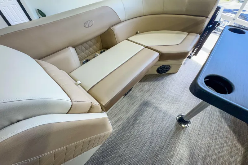 Slide: The Image of Luxurious seating in 2026 Veranda Vista 22F2/2/1 boat with beige upholstery and table. - 18