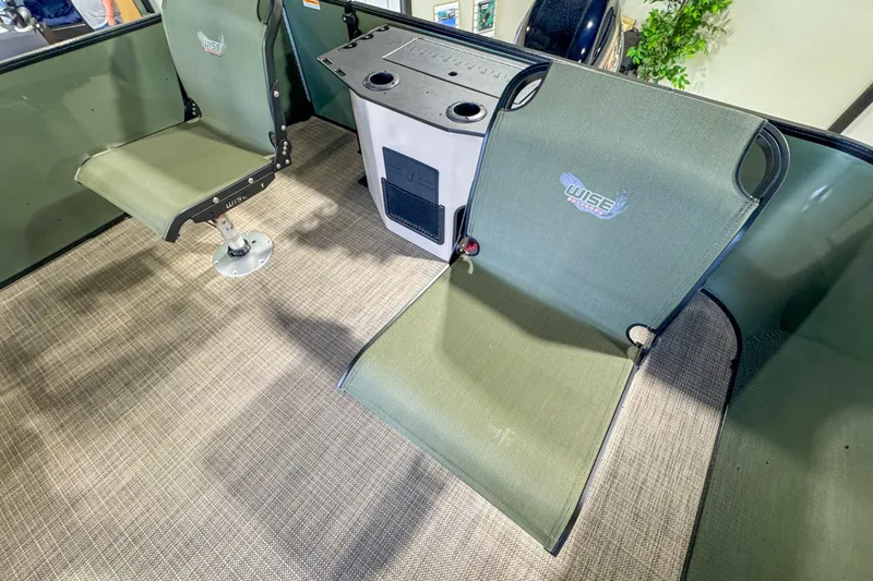 Slide: The Image of Interior of 2026 Veranda Vista 22F2/2/1 with green Wise boat seats. - 20