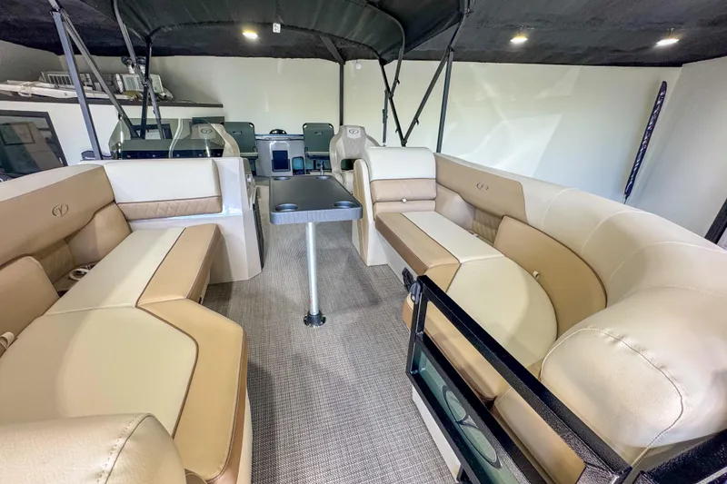 Slide: The Image of Luxurious interior of 2026 Veranda Vista 22F2/2/1 pontoon boat with plush seating. - 22