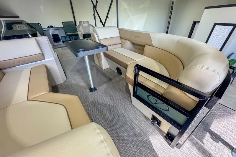 Slide: The Image of Luxurious interior of 2026 Veranda Vista 22F2/2/1 pontoon boat with plush seating and table. - 23