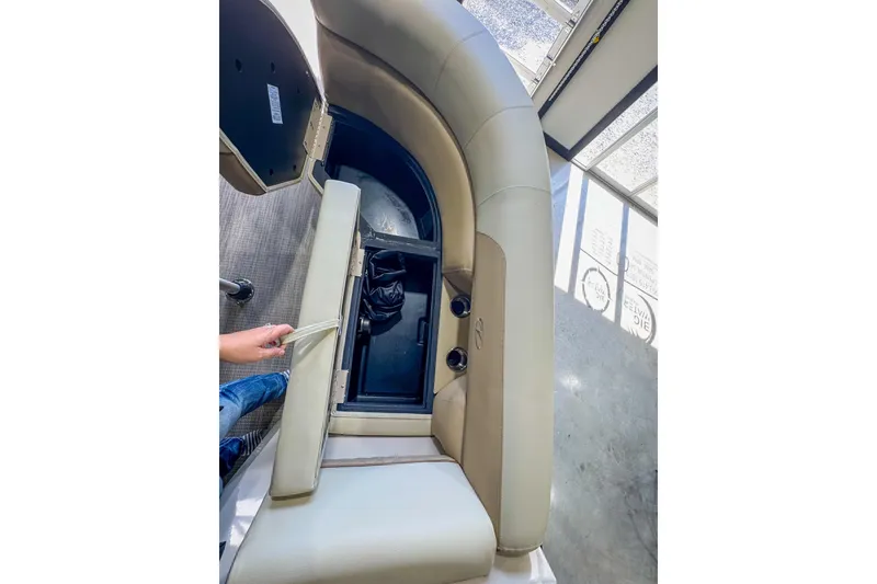 Slide: The Image of 2026 Veranda Vista 22F2/2/1 boat interior with storage compartment open. - 24