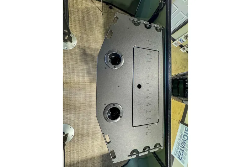 Slide: The Image of 2026 Veranda Vista 22F2/2/1 boat deck with cup holders and measurement markings. - 25