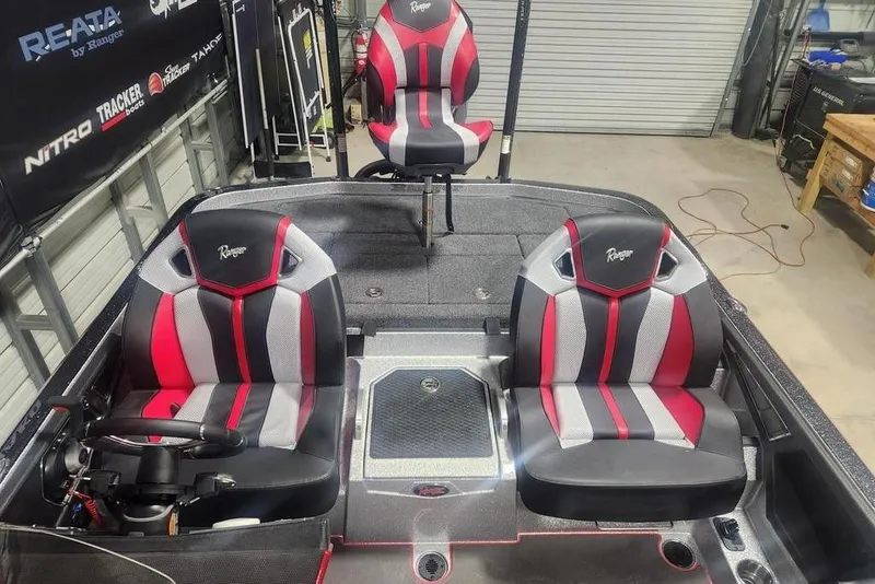 Slide: The Image of 2025 Ranger Z520R Cup-Equipped boat interior with stylish red and black seating. - 11