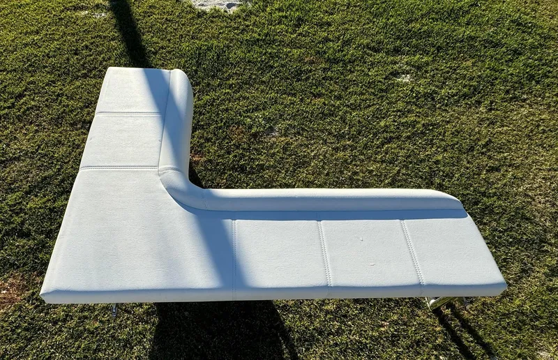 Slide: The Image of Contender 32 ST 2023 boat seat cushion on grass. - 20