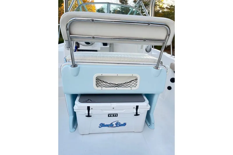Slide: The Image of 2005 Sailfish 218 WAC boat interior with Yeti cooler and seating. - 42