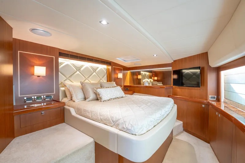 Slide: The Image of Luxurious bedroom interior of 2016 Horizon PC52 yacht with elegant wood finishes. - 15