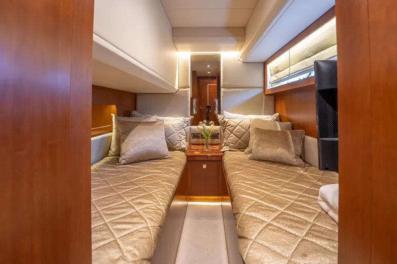 Slide: The Image of Luxurious 2016 Horizon PC52 yacht cabin with elegant bedding and ambient lighting. - 28
