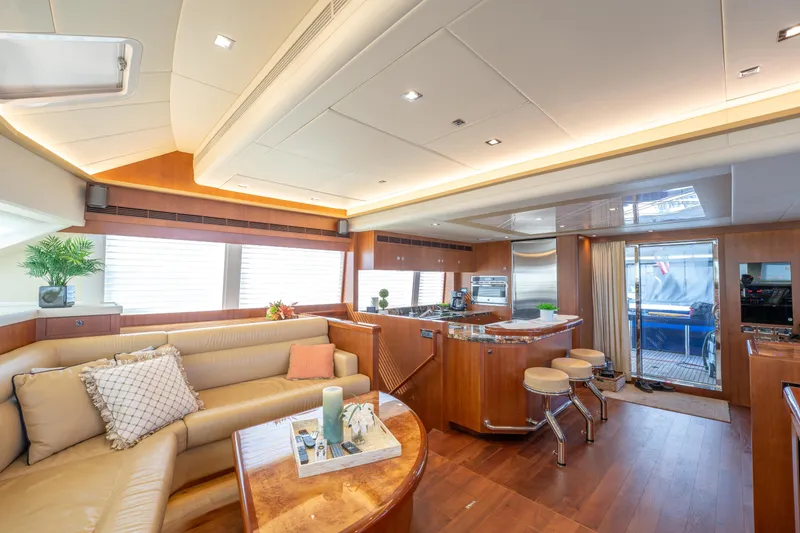 Slide: The Image of Luxurious interior of 2016 Horizon PC52 yacht with modern kitchen and cozy seating area. - 8