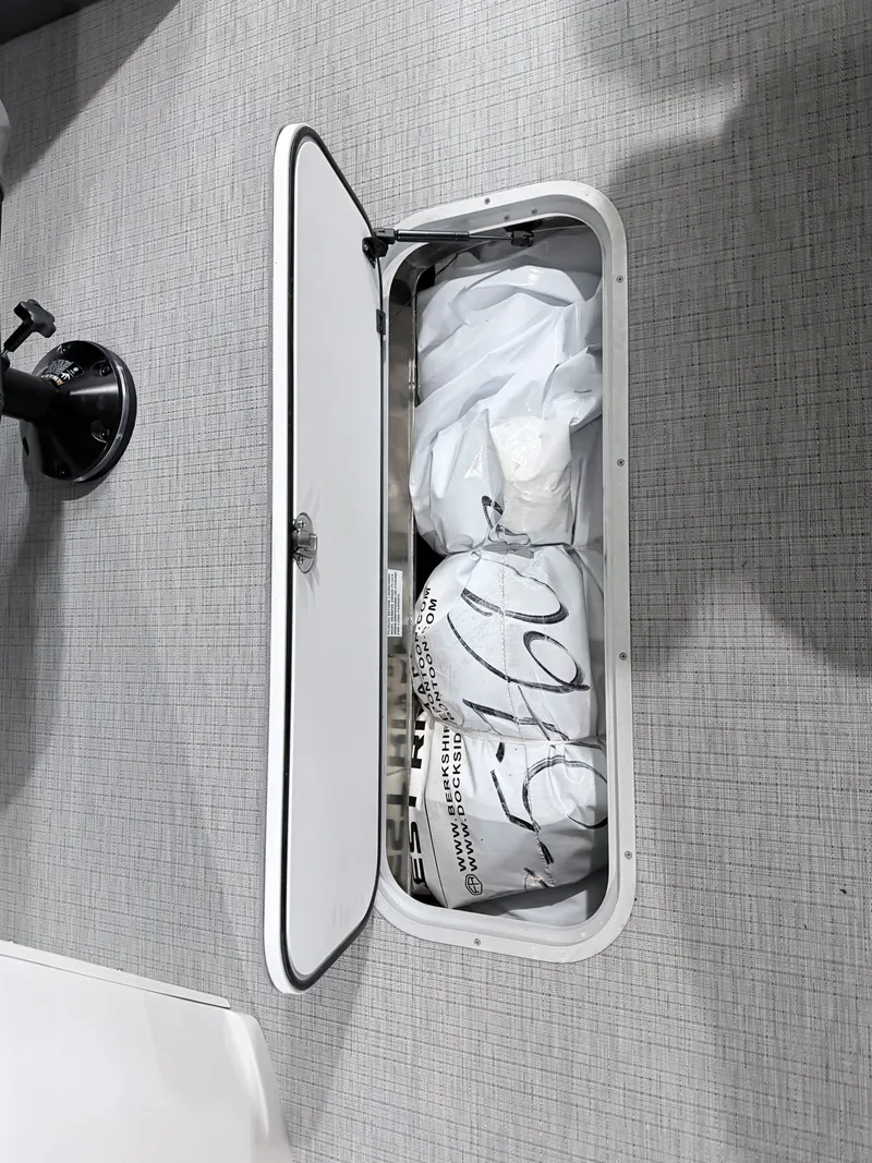 Slide: The Image of Storage compartment in Berkshire CTS Series 22RFX CTS boat, 2026 model. - 13