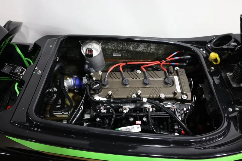 Slide: The Image of Engine compartment of a 2022 Kawasaki Jetski SX-R, showcasing detailed internal components. - 17