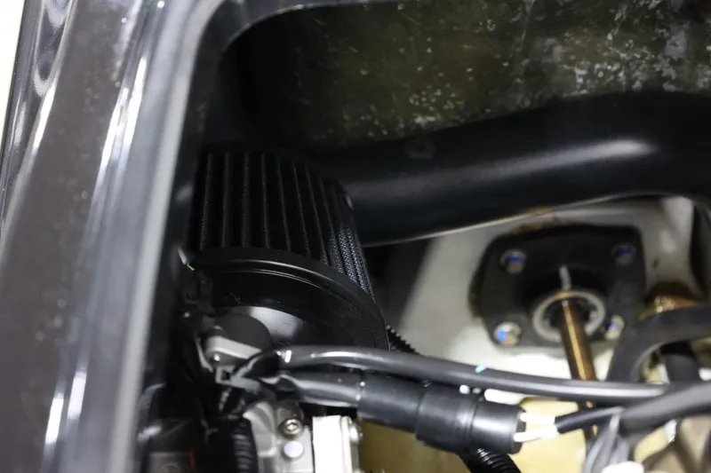 Slide: The Image of Engine compartment of 2022 Kawasaki Jetski SX-R, showing internal components and wiring. - 19