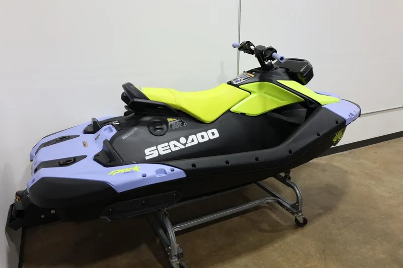 The Image of 2024 Sea-Doo Spark Trixx for 1, lime green and black, on display indoors. - 1