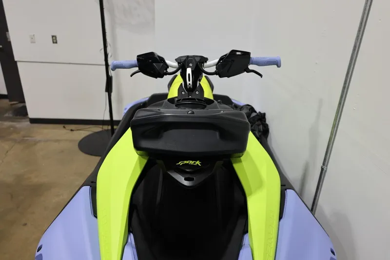 Slide: The Image of 2024 Sea-Doo Spark Trixx for 1, vibrant design, indoor display. - 18