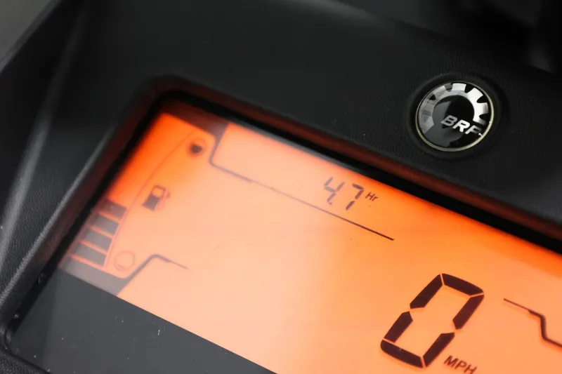 Slide: The Image of Close-up of 2024 Sea-Doo Spark Trixx dashboard displaying 47 hours and 0 mph. - 19