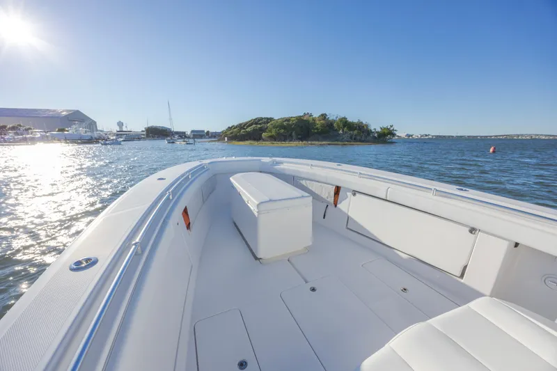 Slide: The Image of 2015 Invincible 39 Open Fisherman boat on calm water, sunny day, scenic view. - 19