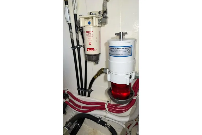 Slide: The Image of Fuel filter system in 2018 Tiara Yachts C44 Coupe engine room. - 36