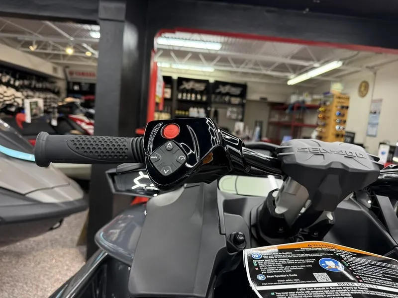 Slide: The Image of Close-up of Sea-Doo GTR™-X 300 iBR 2026 handlebar. - 11
