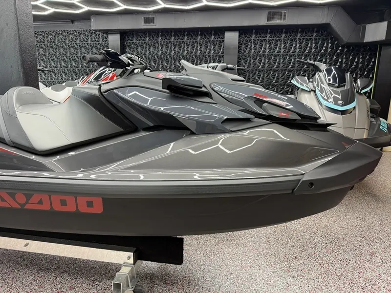 Slide: The Image of 2026 Sea-Doo GTR™-X 300 iBR jet ski in modern showroom. - 2