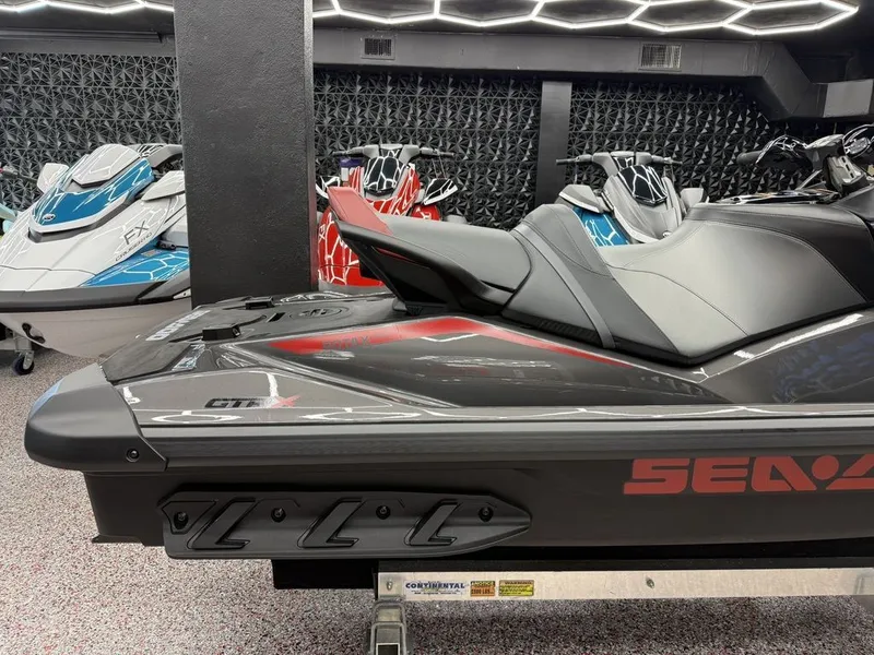 Slide: The Image of 2026 Sea-Doo GTR-X 300 iBR jet ski in showroom. - 6