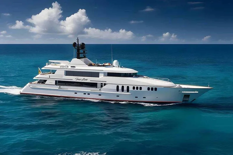 The Image of Luxurious 2003 Trinity Yachts motoryacht cruising on clear blue ocean waters. - 1