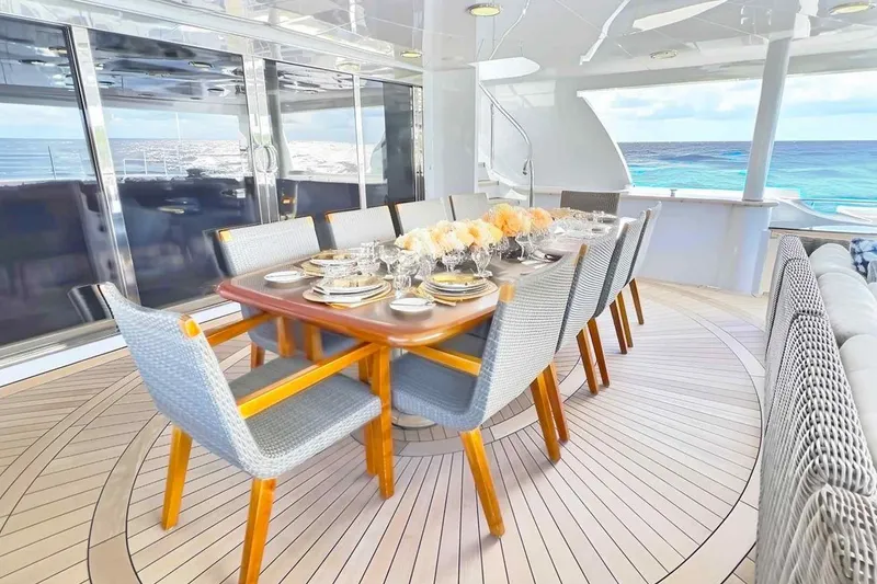 Slide: The Image of Luxurious dining area on 2003 Trinity Yachts motoryacht with ocean view. - 21