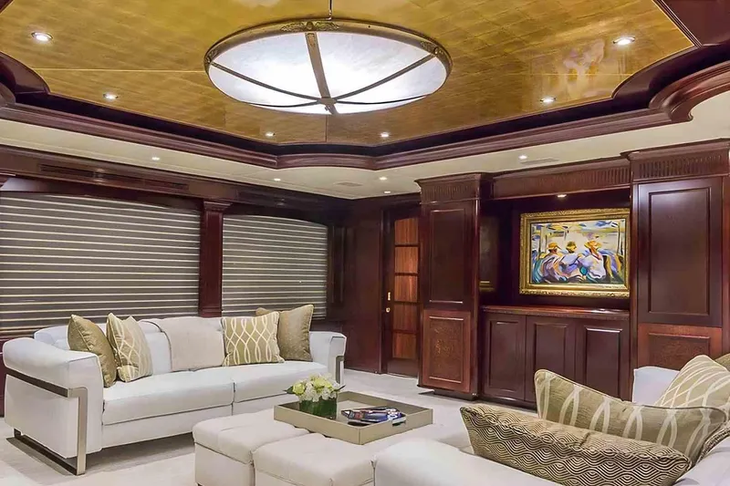 Slide: The Image of Luxurious interior of 2003 Trinity Yachts motoryacht with elegant seating and artwork. - 3