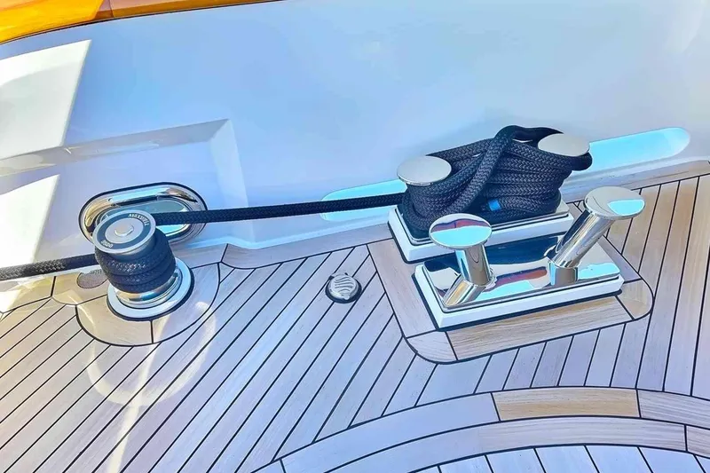 Slide: The Image of Deck of 2003 Trinity Yachts Motoryacht with polished cleats and rope. - 32