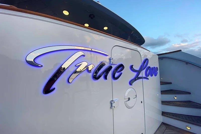 Slide: The Image of Luxurious 2003 Trinity Yachts motoryacht with "True Love" illuminated signage. - 44