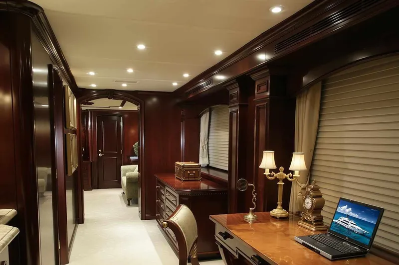 Slide: The Image of Luxurious interior of 2003 Trinity Yachts motoryacht with elegant wood furnishings and ambient lighting. - 6