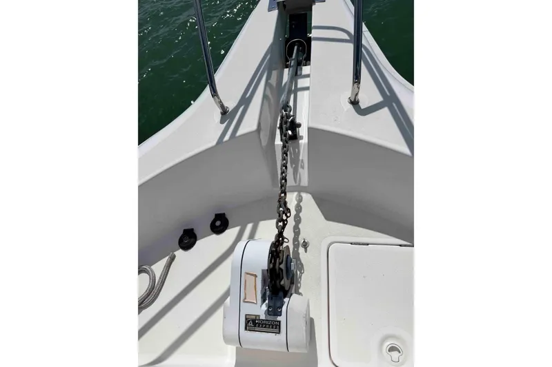 Slide: The Image of 1999 Silverton 392 Motor Yacht bow view on sparkling water. - 9