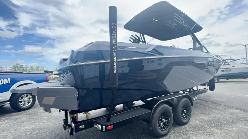 Slide: The Image of 2024 Axis A245 boat on trailer, featuring sleek design and modern features. - 4