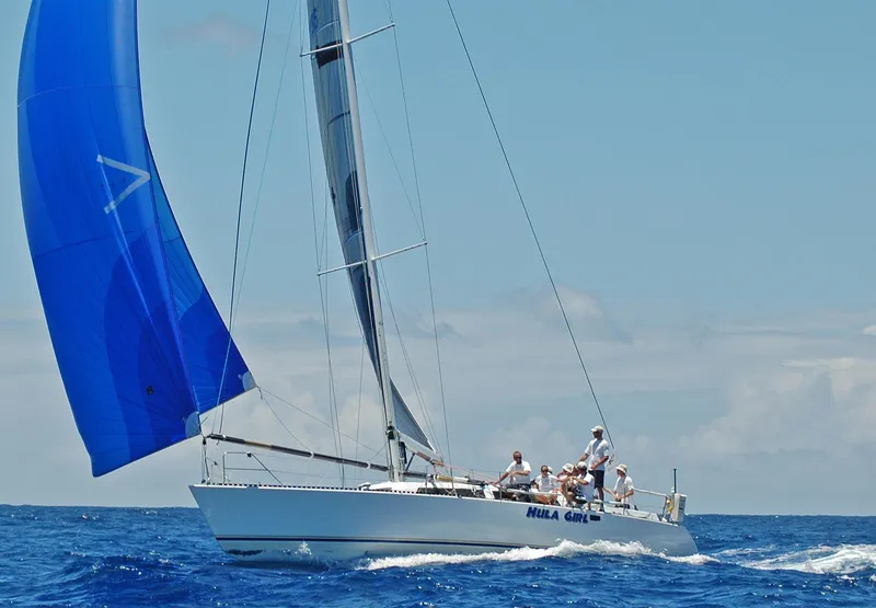 Slide: The Image of Sailing yacht Santa Cruz SC 50, 1980, with blue spinnaker on open sea. - 14