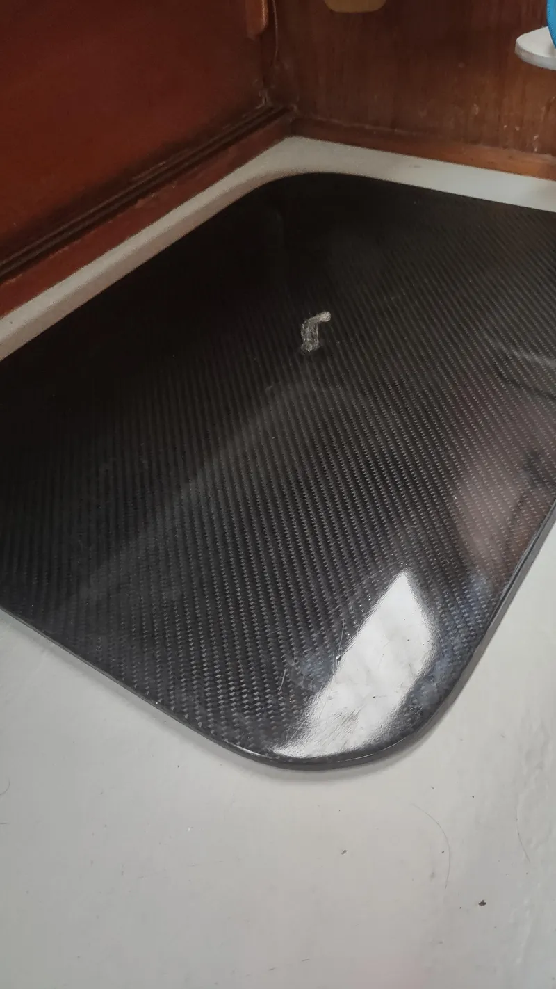 Slide: The Image of Carbon fiber panel in a 1980 Santa Cruz SC 50 boat interior. - 26