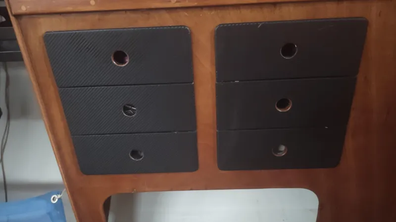 Slide: The Image of Wooden cabinet with black panel drawers, Santa Cruz SC 50, 1980 model. - 35