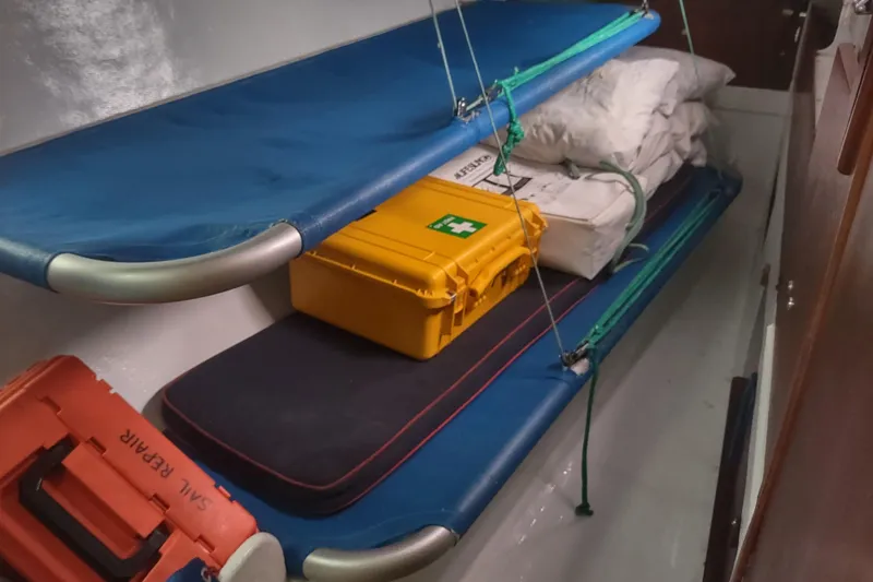 Slide: The Image of Interior of 1980 Santa Cruz SC 50 sailboat with bunks and safety equipment. - 36