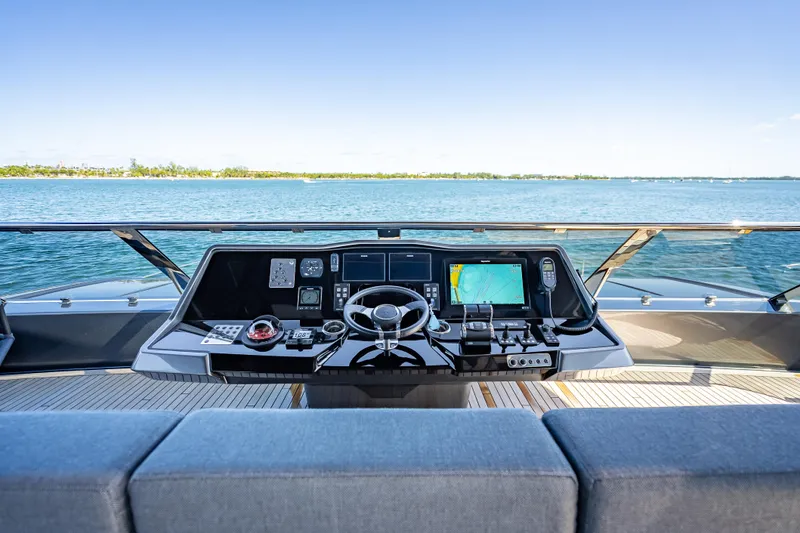 Slide: The Image of Helm of 2026 Sunreef 60 Power yacht with navigation controls and ocean view. - 29