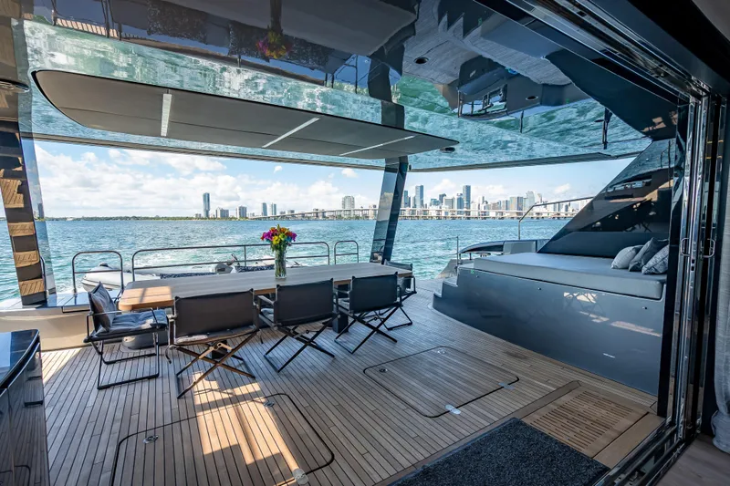 Slide: The Image of Luxurious Sunreef 60 Power yacht interior with city skyline view, 2026 model. - 34