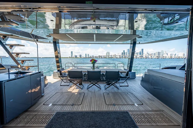 Slide: The Image of Luxurious Sunreef 60 Power yacht interior with ocean view, featuring modern seating and elegant design. - 35