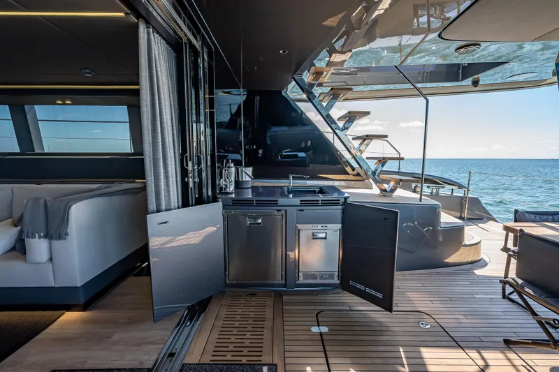 Slide: The Image of Luxurious Sunreef 60 Power yacht interior with modern kitchen and ocean view, 2026 model. - 39